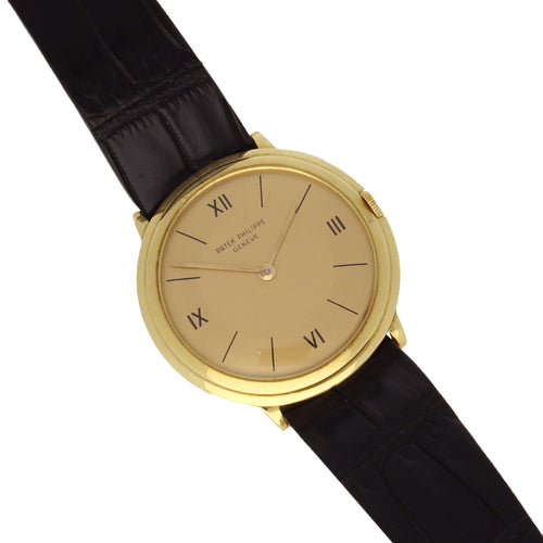 18ct yellow gold, reference 2501 'Disco Volante' wristwatch. Made 1954