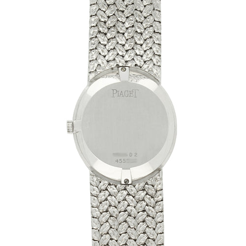 18ct white gold oval bracelet watch with diamond set dial and bezel. Made 1970s