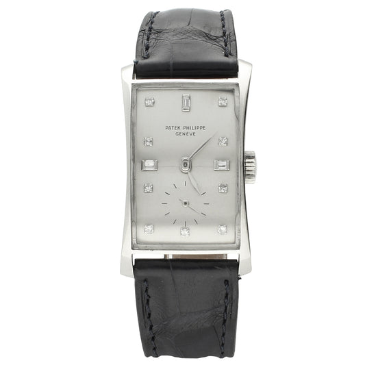 Platinum, reference 1593 ''Hour Glass''  wristwatch with diamond set dial. Made 1954