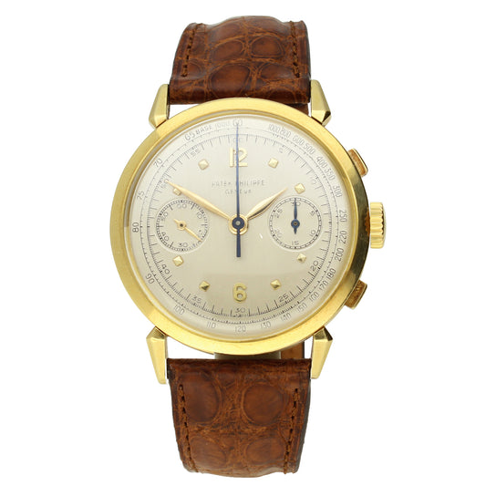 18ct yellow gold, reference 1579 chronograph wristwatch. Made 1956