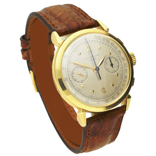 18ct yellow gold, reference 1579 chronograph wristwatch. Made 1956
