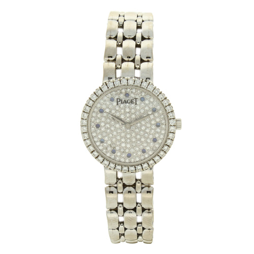 18ct white gold 'round cased' with diamond set dial and bezel bracelet watch. Made 1970s
