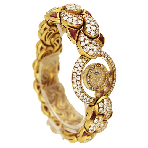 18ct yellow gold, ruby and diamond set 'Happy Diamonds' bracelet watch. Made 1980