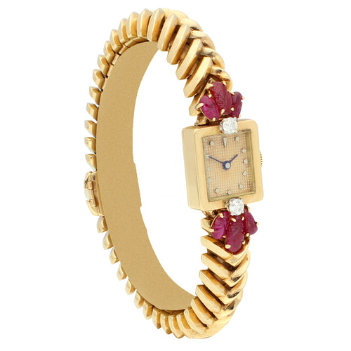 18ct rose gold, diamond and ruby set bracelet watch. Made 1940s