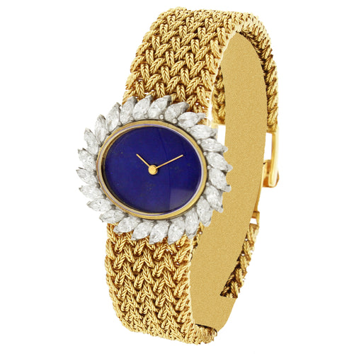 18ct yellow gold and diamond set bracelet watch with lapis lazuli dial. Made 1970's