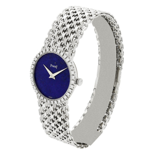 18ct white gold 'round cased' bracelet watch with lapis lazuli dial and diamond set bezel. Made 1970's