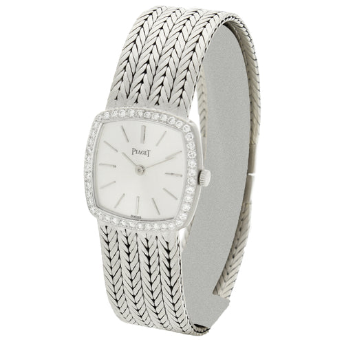 18ct white gold 'cushion cased' with silvered dial and diamond set bezel bracelet watch. Made 1970's