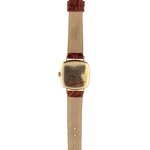 18ct yellow gold cushion cased wristwatch with enamel dial, retailed by Shreve & Co. San Francisco. Made 1920