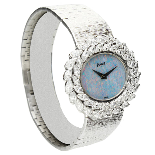 18ct white gold and diamond set Piaget, reference 9385 bracelet watch with opal dial. Made 1972