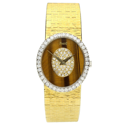 18ct yellow gold Piaget, reference  9826 bracelet watch with tigers eye/diamond set dial and diamond set bezel. Made 1970's