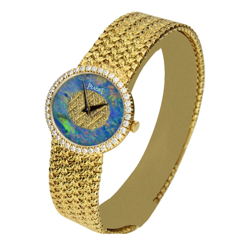 18ct yellow gold and opal oval bracelet watch. Made 1970's