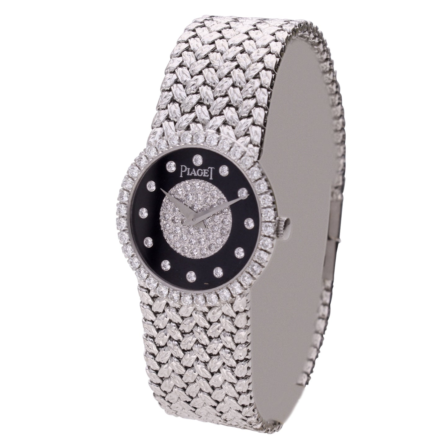 18ct white gold Piaget bracelet watch with onyx & diamond set dial. Made 1970