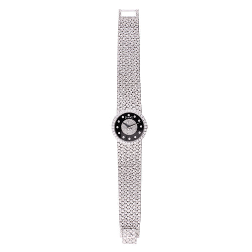 18ct white gold Piaget bracelet watch with onyx & diamond set dial. Made 1970
