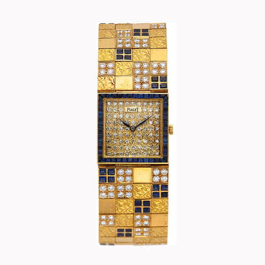 18ct yellow gold, diamond and sapphire set Piaget, reference 9352 bracelet watch. Made 1979