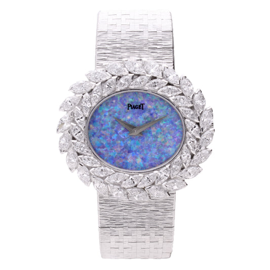18ct white gold and diamond set, reference 9385 bracelet watch with opal dial. Made 1973