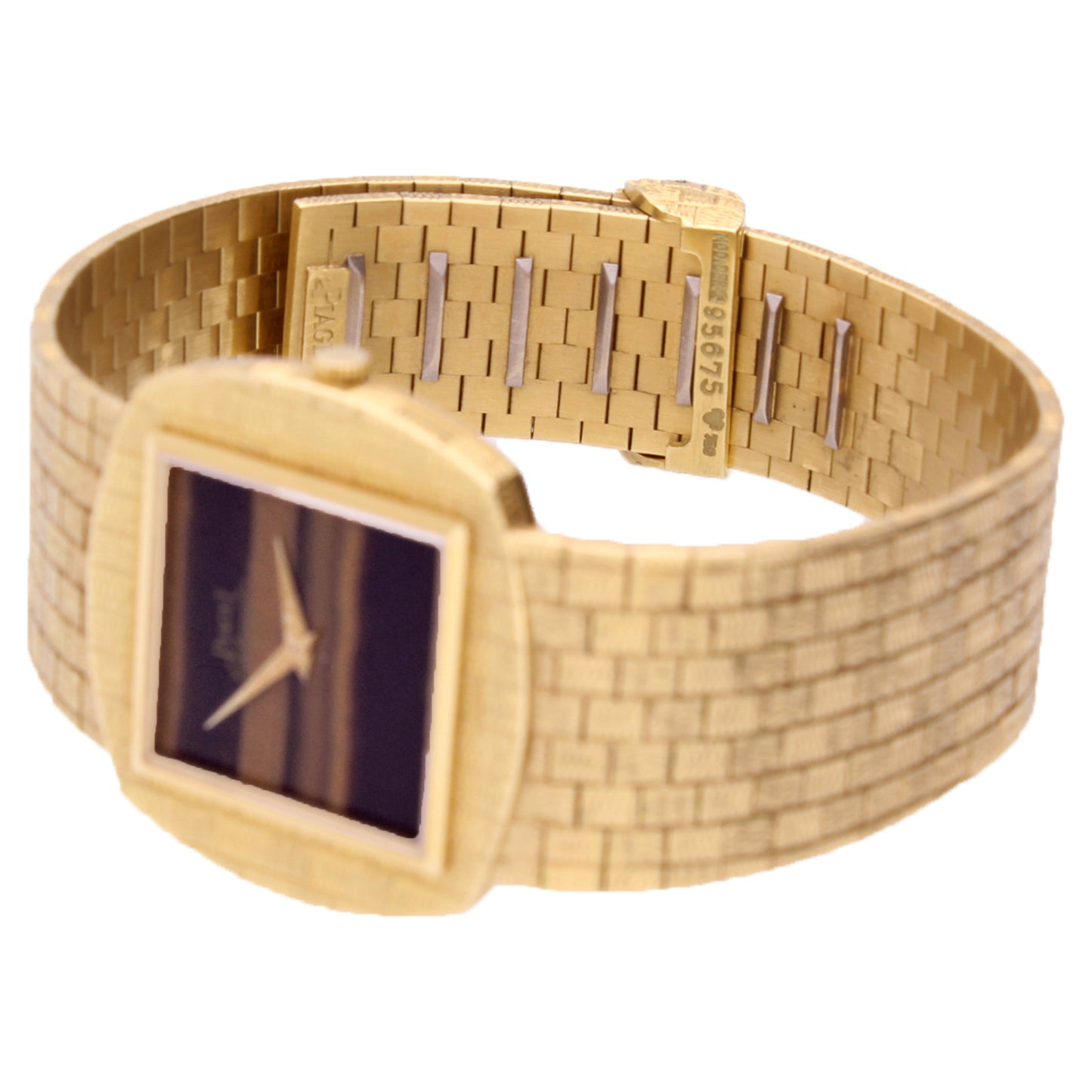 18ct yellow gold Piaget, reference 12461 automatic bracelet watch with tigers eye dial. Made 1971