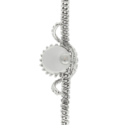 Platinum and diamond set bracelet watch. Made 1956