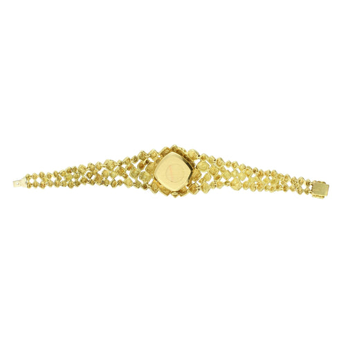 18ct yellow gold 'Rocaille d'Or' bracelet watch by Gilbert Albert. Made 1963