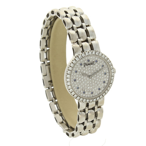 18ct white gold 'round cased' with diamond set dial and bezel bracelet watch. Made 1970s