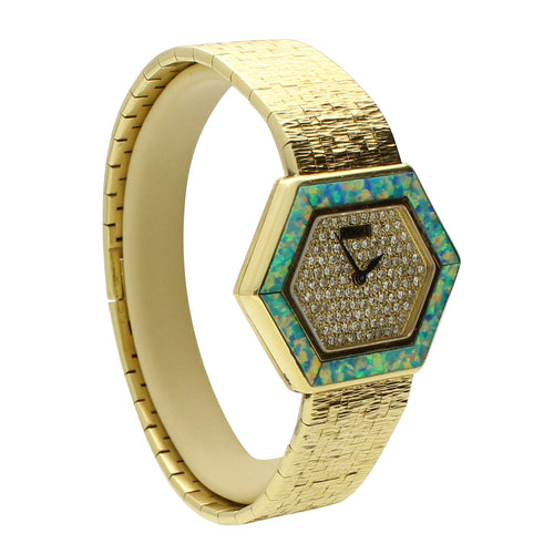18ct yellow gold 'hexagonal cased' bracelet watch with pavé diamond set dial and opal set bezel. Made 1970's