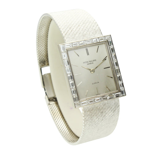 18ct white gold square cased wristwatch with diamond set bezel. Made 1970's